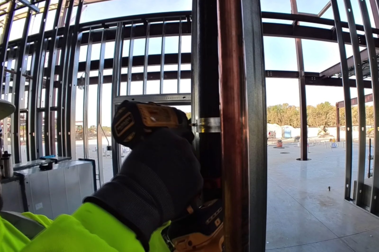 Commercial plumbing technician at work on a business property in Fort Myers, FL