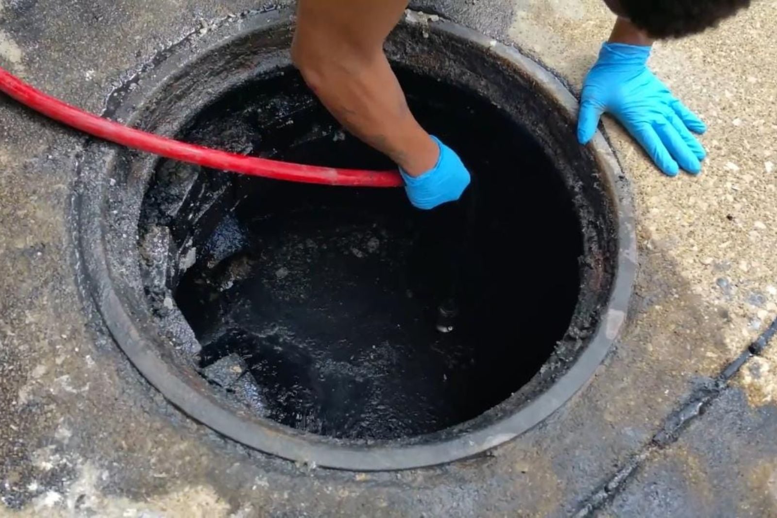 Technician performing hydro jetting on a sewer cleanout in Fort Myers, FL