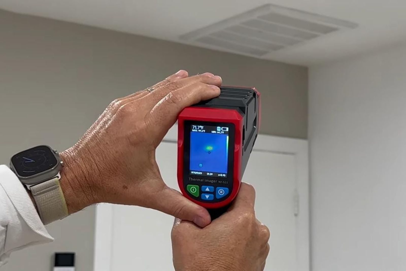 Plumber using leak detection equipment in a Fort Myers, FL home