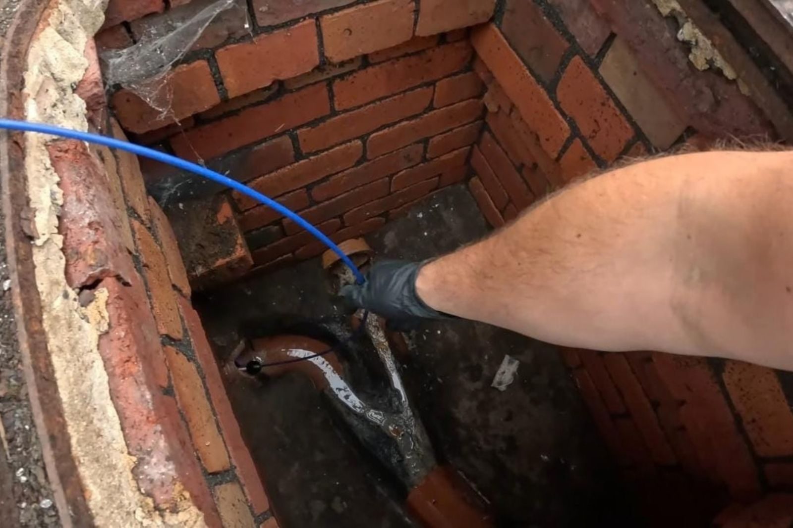 Plumber inspecting a sewer line for repair in Fort Myers, FL