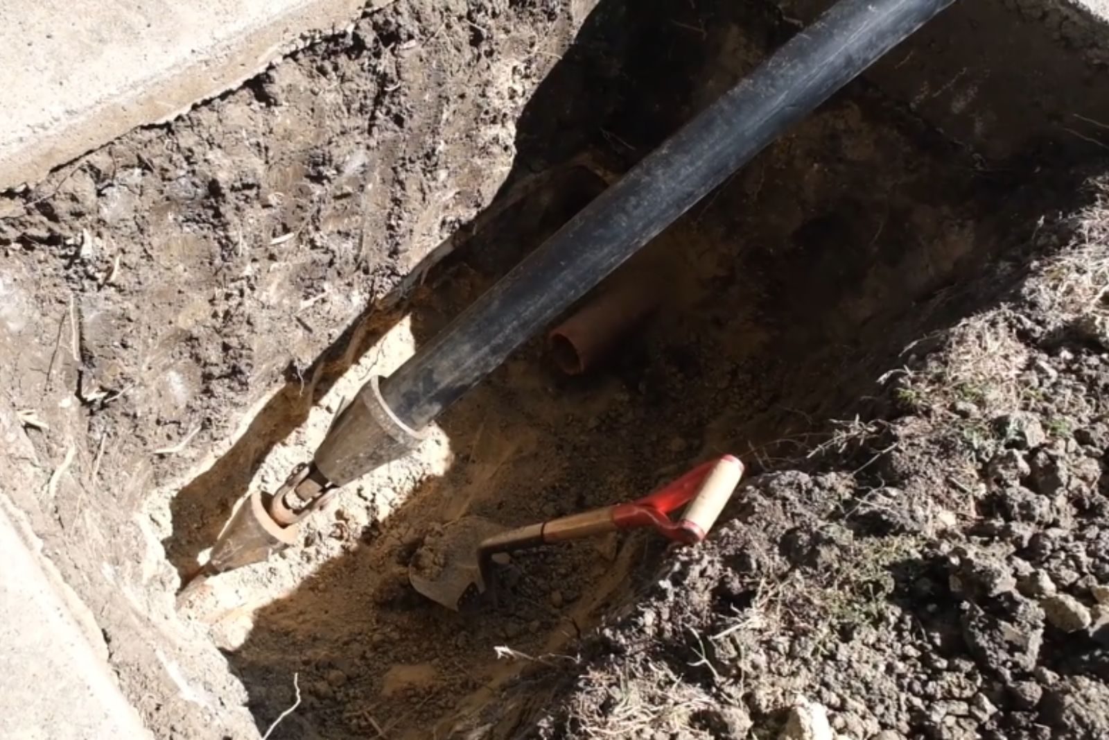Sewer line replacement work in progress at a Fort Myers, FL property