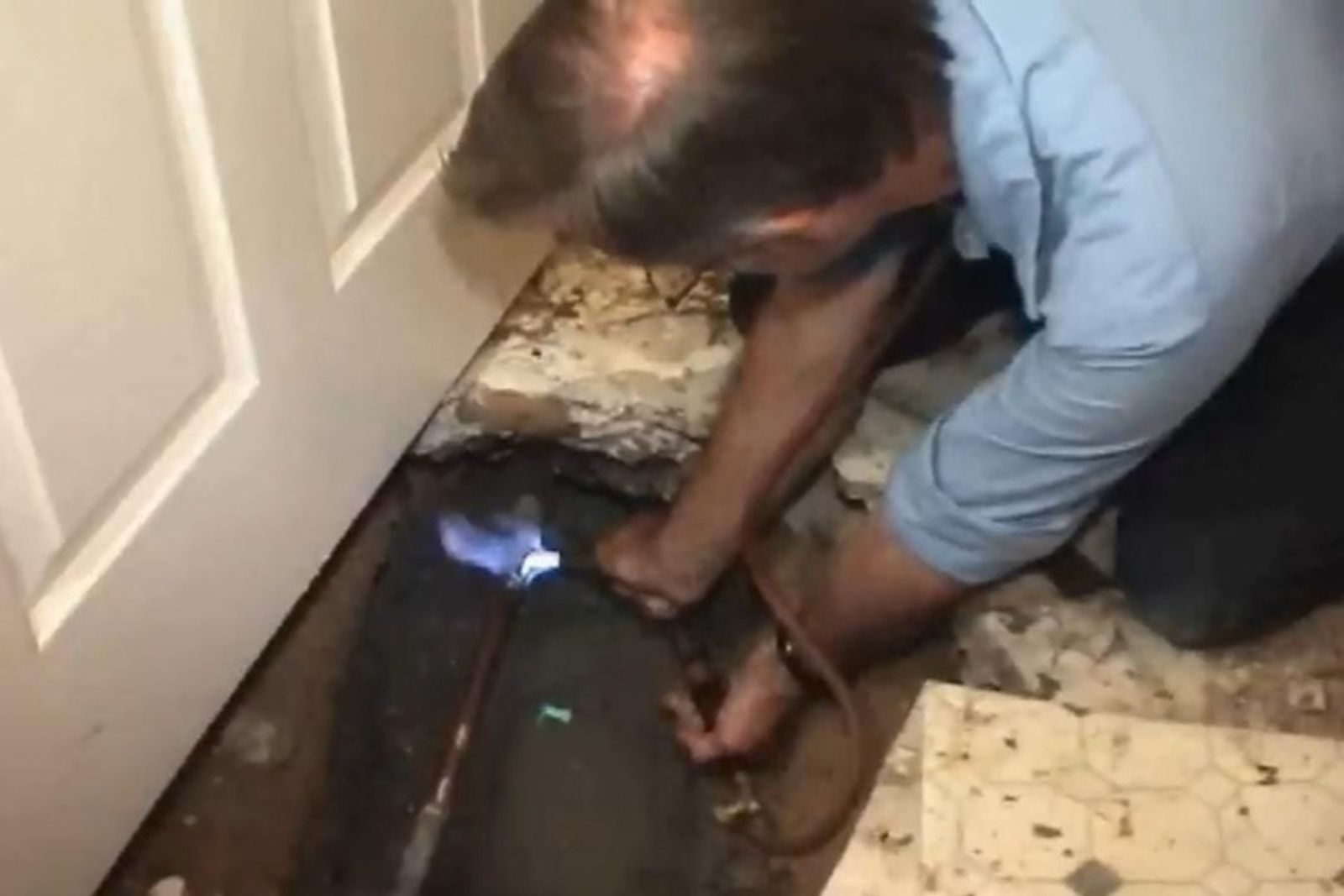 Plumber diagnosing a slab leak in a Fort Myers, FL home